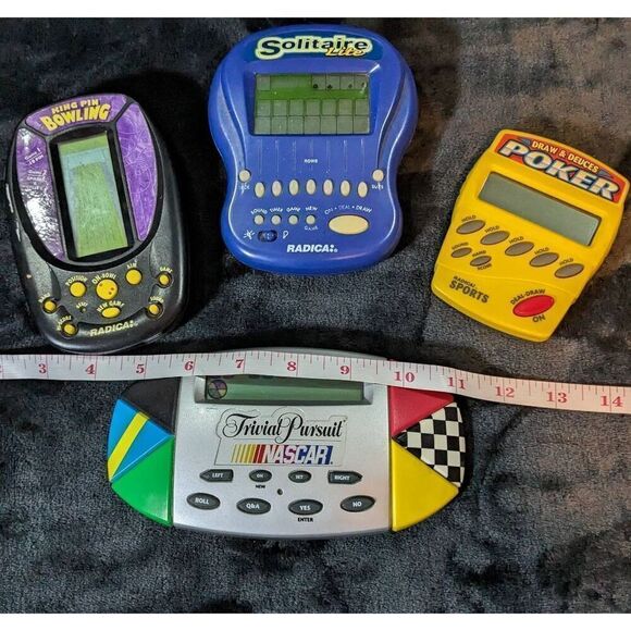 Four vintage hand held video games all tested. By Radical